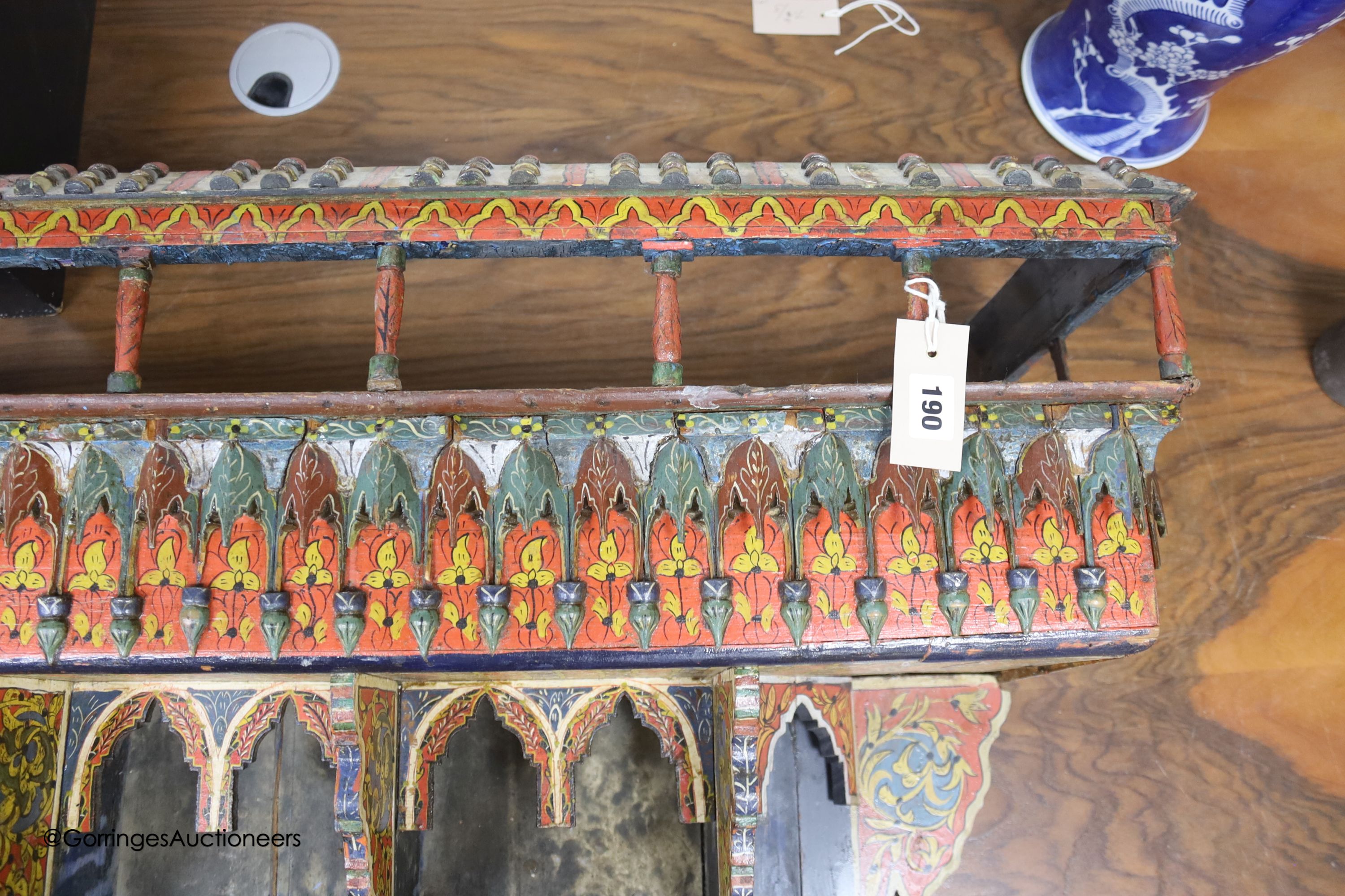 A 19th century painted wood wall shelf, width 106cm depth 26cm height 78cm